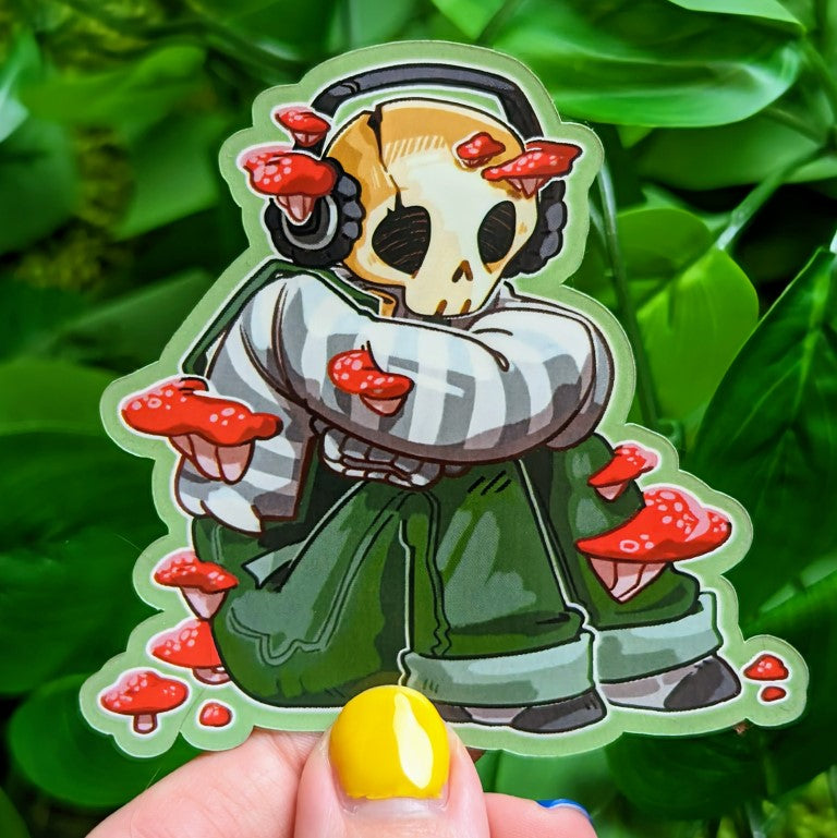 A sticker featuring an aesthetic skeleton design with red mushroom accents.