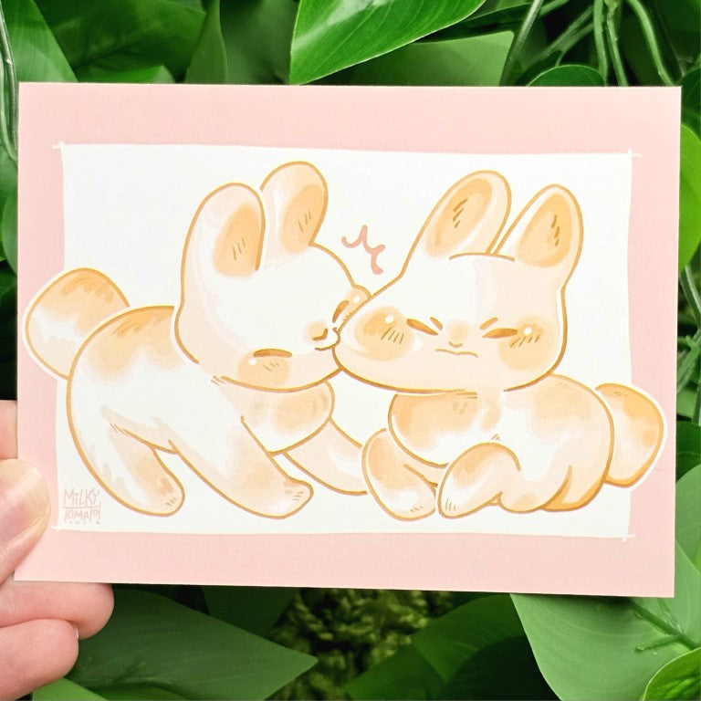 Marshmallow Bunnies mini print 3 in Milky's hand