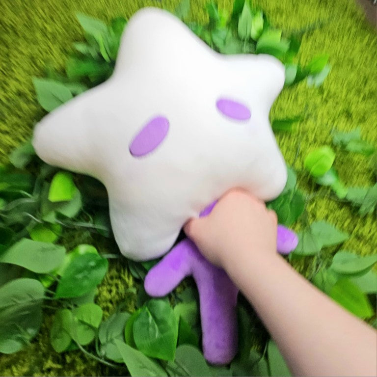 Blurred excitement photo of a star baby plushie