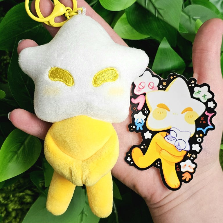 A yellow star baby plushie and the coordinating sticker.