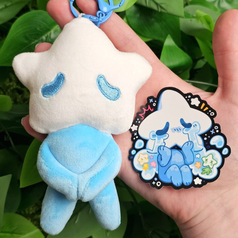 A blue star baby plushie and the coordinating sticker.