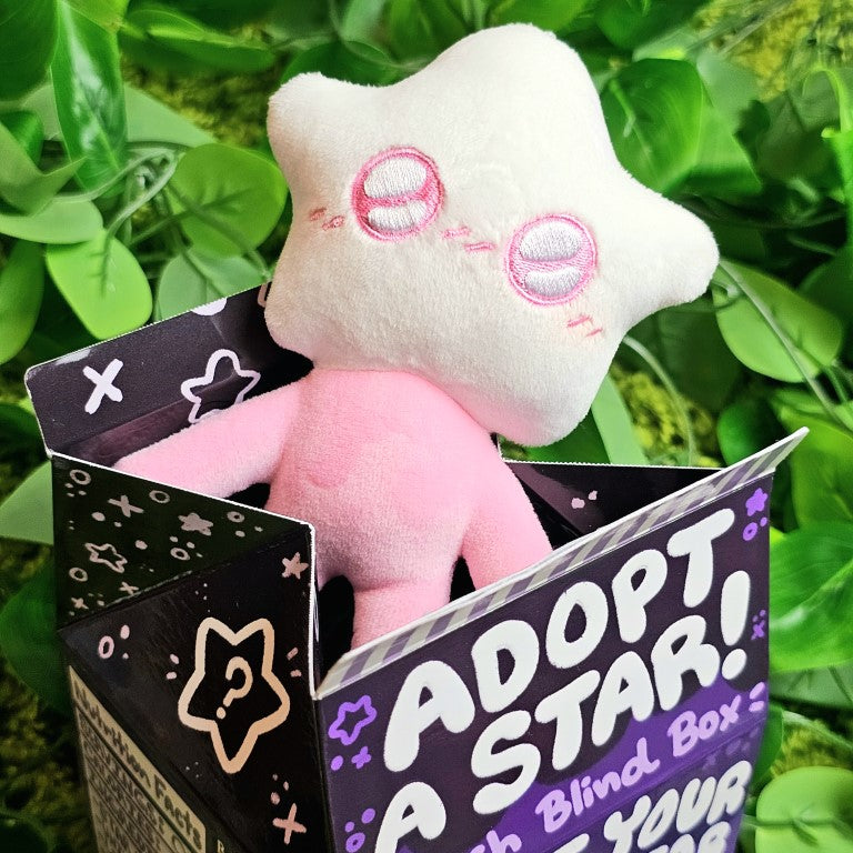 Pink star baby in an adoption box.