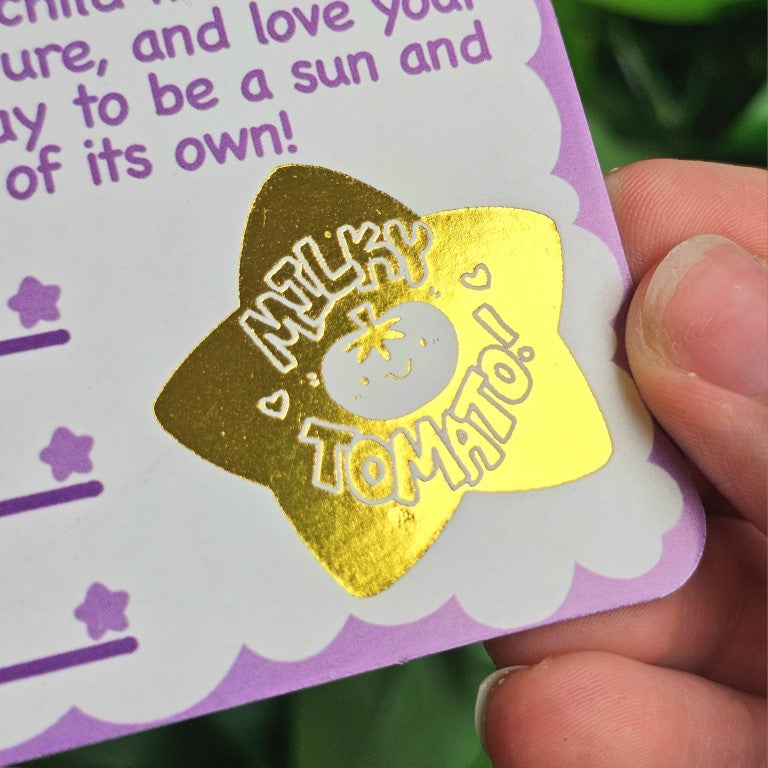 Milky Tomato gold seal on the adoption certificate.