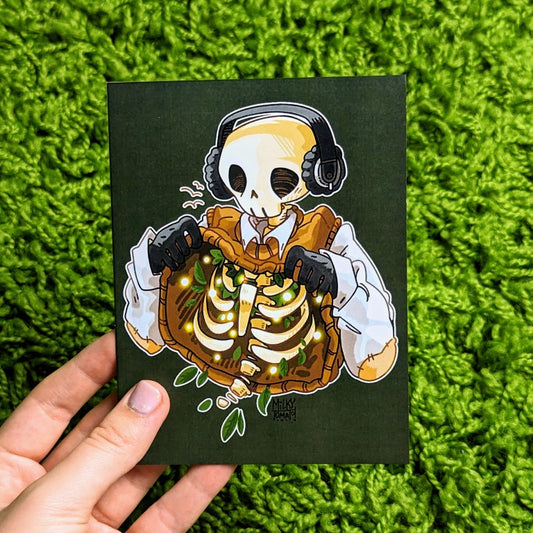 The mini brown Skeleton Cade chilling print.