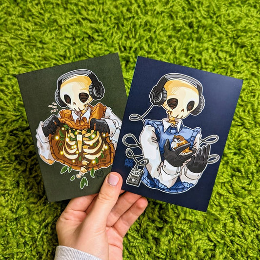 Both the mini brown and blue Skeleton Cade chilling prints.