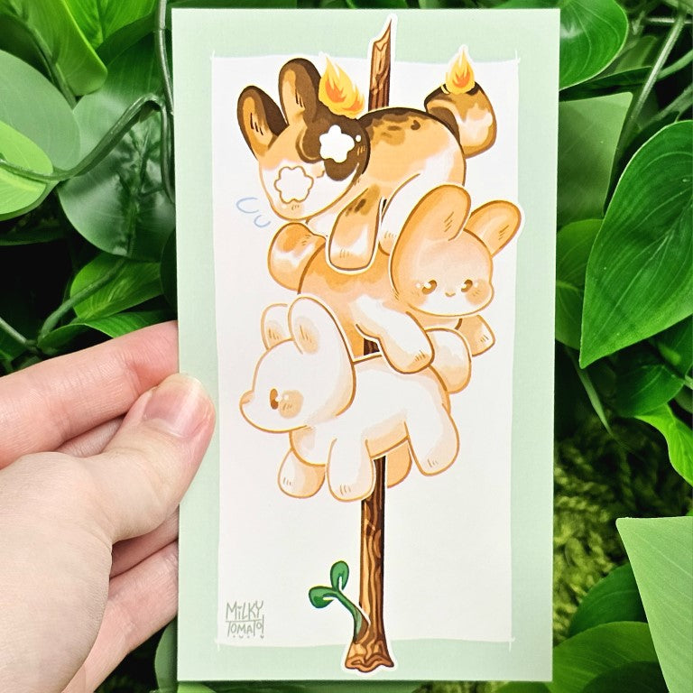 Marshmallow Bunnies mini print 2 in Milky's hand