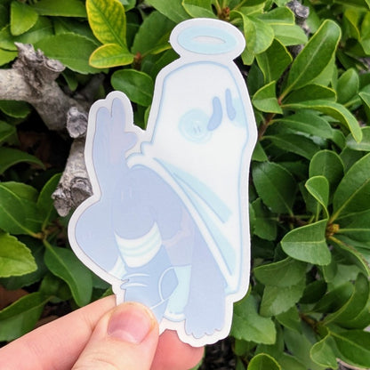 Echo, the ghost angel sticker with the adhesive protectant sheet on the front of the sticker.
