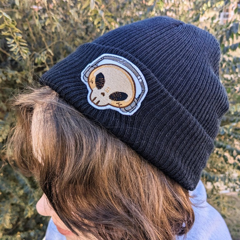 Aesthetic skeleton beanie on a person's head